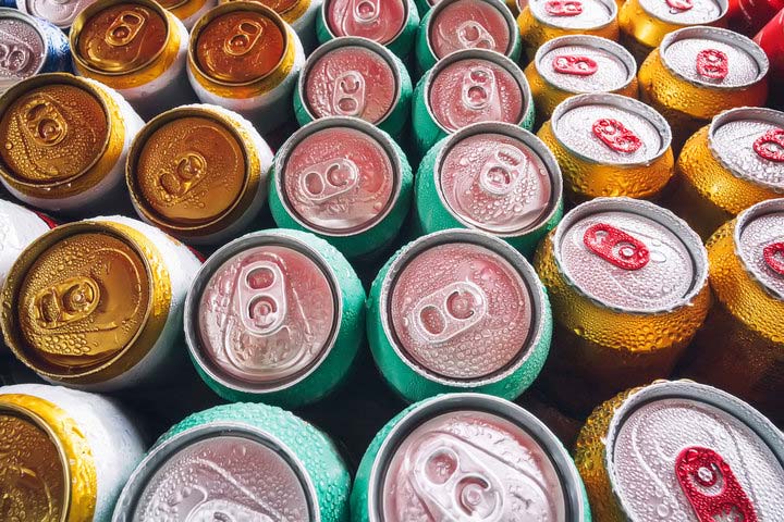 soda cans with condensation on them